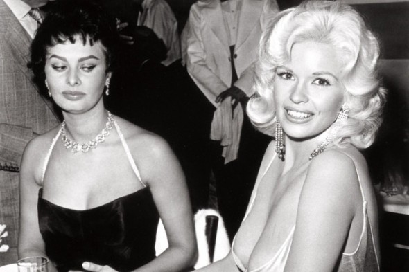 Sophia Loren apparently waiting for Jayne Mansfield to have a wardrobe malfunction...